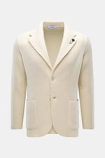 Lardini Cashmere Strickblazer creme, Slim Fit, tailliert, frontale Nahaufnahme, feines Strickbild, Blüten-Anstecker, zwei Knöpfe, Hüfttaschen.