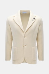 Lardini Cashmere Strickblazer creme, Slim Fit, tailliert, frontale Nahaufnahme, feines Strickbild, Blüten-Anstecker, zwei Knöpfe, Hüfttaschen.