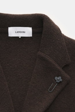Close-up top front view of Lardini Cashmere knit blazer dark brown showing fine knit texture, step lapel with flower pin, and label.

<p>Exquisite knit blazer from LARDINI: This model in smooth, fine pure cashmere knit adds warmth and style to your wardro