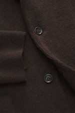 Close-up front view of Lardini Cashmere knit blazer dark brown showing fine knit texture, two buttons, and patch pocket.

<p>Exquisite knit blazer from LARDINI: This model in smooth, fine pure cashmere knit adds warmth and style to your wardrobe. A pin wi