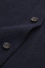 Close-up front-side view of Lardini Cardigan navy showing pure virgin wool texture, soft feel, heavy quality, medium fine knit pattern, regular fit, four-button placket, stand-up collar, and patch hip pockets.