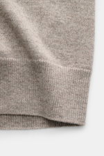 Close-up front view of Brunello Cucinelli Cashmere cardigan beige melange showing fine knit pure cashmere fabric with flexible ribbed bands.

Description: <p>BRUNELLO CUCINELLI adds a touch of luxury to our casual wardrobe with this cardigan in smooth cas