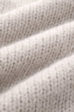 Close-up front view of Iris von Arnim Cashmere-silk cardigan 'Felias' sand showing voluminous knit pattern, mix of cashmere and silk, very soft feel.