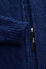 Close-up front view of Iris von Arnim Cashmere-silk cardigan 'Felias' dark blue, showing mix of cashmere and silk, very soft feel, voluminous knit pattern, slim fit, two-way zipper, ribbed stand-up collar, and comfortable ribbed cuffs.