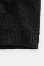 Filippo de Laurentiis Cardigan schwarz, Detailaufnahme von unten, mittelfeines Strickbild, Oversized Fit, Umlegekragen, weicher Griff, Rippbündchen, Mix aus Cashmere, Seide, Microfaser.