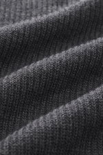 Close-up perspective of the Barena Venezia Cardigan "Dori Cruna" dark grey melange knit fabric, showing soft touch, medium-fine rib stitch pattern, knit from pure virgin wool. Features Slim Fit, high closing collar, two-way zipper, elastic rib cuffs, and 
