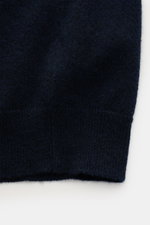 Alt tag (125 characters): Close-up front view of FTC Cashmere cardigan navy showing fine knit, ribbed bands, and soft, lightweight fair trade cashmere fabric.

Description: 
<p>Fair Trade cashmere, timeless design: This cardigan by FTC has been sustainabl
