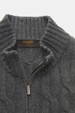 Close-up front view of the Moorer Cashmere-silk cardigan 'Dean' dark grey melange, showing mix of cashmere and silk, very soft feel, medium fine knit pattern, classic cable knit design, slim fit, two-way zipper, ribbed stand-up collar, and flexible ribbed