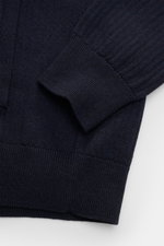 Close-up front view of Polo Ralph Lauren Cardigan navy mottled showing fine pure cotton knit, ribbed elastic cuffs, and hem.

<p>Timeless knit basic: With this cardigan in pure cotton, POLO RALPH LAUREN has created a versatile layering piece for the sprin