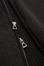 Close-up front view of the Polo Ralph Lauren Cardigan anthracite showing ribbed pure cotton fabric and concealed two-way zip with POLO engraved pulls.

<p>This ribbed cardigan in pure cotton by POLO RALPH LAUREN adds an extra layer of comfort from spring 