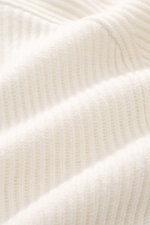 Close-up front view of von Braun Cashmere Cardigan off-white showing soft pure cashmere fabric with classic ribbed knit texture. Basic for the cold season made from soft cashmere: The VON BRAUN cardigan in classic ribbed knit can be elegantly combined wit