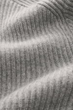 Close-up front view of the von Braun Cashmere Cardigan light grey melange showing classic ribbed knit texture and soft cashmere fibers.  

Description:  
Basic for the cold season made from soft cashmere: The VON BRAUN cardigan in classic ribbed knit can 