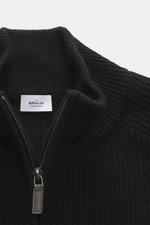 Close-up top view of von Braun Cashmere Cardigan black showing high collar, two-way zipper, and classic ribbed knit texture, pure cashmere, soft touch, slim fit, knitted raglan sleeves, elastic ribbed cuffs. Basic for the cold season made from soft cashme