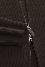 Close-up front view of the von Braun Cashmere Cardigan brown showing the soft ribbed knit fabric, two-way zipper, and elastic cuff, pure cashmere, soft touch, classic ribbed knit, slim fit, high closing collar, knitted raglan sleeves, two-way zipper, elas
