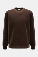 Front view of 04651/ A trip in a bag Rundhalspullover dunkelbraun, a casual brown fleece crewneck sweater with ribbed cuffs and hem.

Description: <p>Legeres Layering Piece: Der Rundhalspullover von 04651/ A TRIP IN A BAG überzeugt mit seiner samtigen Fle