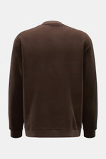 Back view of the 04651/ A trip in a bag Rundhalspullover dunkelbraun, a dark brown fleece sweatshirt with a round rib-knit neckline, soft wool-cotton blend, regular fit, and ribbed cuffs, photographed against a plain background.

<p>Legeres Layering Piece