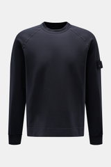 Front view of Stone Island Sweatshirt 'Ghost Piece' navy in stretch cotton with tonal compass badge on sleeve, crew neck, raglan sleeves.

Description: <p>With this sweatshirt in stretch cotton with tonal compass badge on the sleeve, STONE ISLAND offers a