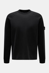 Front view of Stone Island Sweatshirt 'Ghost Piece' black in stretch cotton with tonal compass badge on sleeve, crew neck, raglan sleeves.

Description: With this sweatshirt in stretch cotton with tonal compass badge on the sleeve, STONE ISLAND offers a c