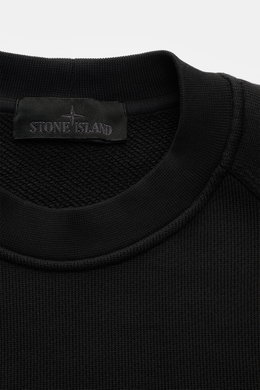 Close-up front view of Stone Island Crew neck sweatshirt 'Ghost Piece' black, showing ribbed crew neck and textured cotton fabric.

<p>A timeless basic piece: This sporty sweatshirt from the 'Ghost' Capsule Collection by STONE ISLAND provides the perfect 