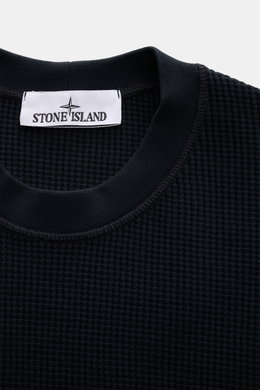 Stone Island Rundhalspullover 'Waffle' navy shown from above, featuring waffle knit texture and ribbed crew neckline.  
<p>Basic Piece mit Twist: Dieser Pullover im Waffelstrick von STONE ISLAND wird zur idealen Grundlage moderner Freizeitlooks und lässt 
