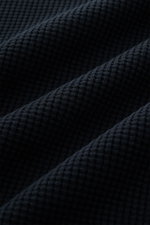 Close-up front view of the textured navy fabric of the Stone Island Rundhalspullover 'Waffle' navy sweater. 

<p>Basic Piece mit Twist: Dieser Pullover im Waffelstrick von STONE ISLAND wird zur idealen Grundlage moderner Freizeitlooks und lässt sich viels