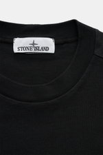 Close-up front view of Stone Island Long sleeve black crew neck sweatshirt showing ribbed collar and label.

<p>With this crew neck long sleeve in heavy cotton jersey with compass badge on the sleeve, STONE ISLAND brings us a comfortable basic for cool ca