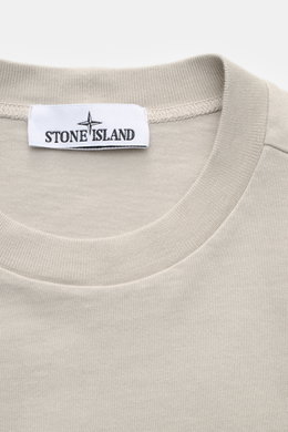 Close-up front view of Stone Island Long sleeve light grey crew neck sweatshirt in heavy cotton jersey with visible Stone Island label inside collar.

<p>With this crew neck long sleeve in heavy cotton jersey with compass badge on the sleeve, STONE ISLAND