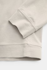 Close-up front view of Stone Island Long sleeve light grey crew neck sweatshirt showing ribbed cuff and hem details.

Description: <p>With this crew neck long sleeve in heavy cotton jersey with compass badge on the sleeve, STONE ISLAND brings us a comfort