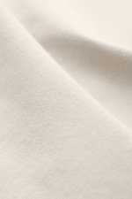 Close-up fabric texture of Stone Island Long sleeve light grey, showing soft, heavy cotton jersey from an angled perspective.

<p>With this crew neck long sleeve in heavy cotton jersey with compass badge on the sleeve, STONE ISLAND brings us a comfortable