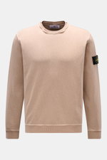 Stone Island Crew neck sweatshirt 'Washed Sweat' beige shown from the front, featuring pure cotton, soft feel, washed effect, regular fit, crew neck with seam, compass badge on upper sleeve, and ribbed bands. STONE ISLAND’s signature piece dyeing is used 