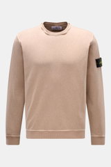 Stone Island Crew neck sweatshirt 'Washed Sweat' beige shown from the front, featuring pure cotton, soft feel, washed effect, regular fit, crew neck with seam, compass badge on upper sleeve, and ribbed bands. STONE ISLAND’s signature piece dyeing is used 