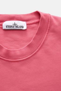 Close-up front view of Stone Island Crewneck Sweatshirt 'Basic Sweat' magenta showing crew neckline and fabric texture.

Description: 
<p>Timeless Basic Piece: The sporty sweatshirt by STONE ISLAND becomes the ideal foundation for casual leisure looks and