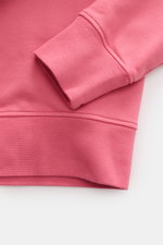 Close-up side view of the Stone Island Crewneck Sweatshirt 'Basic Sweat' magenta showing ribbed cuffs and hem in soft pure cotton fabric.

Additional description:
<p>Timeless Basic Piece: The sporty sweatshirt by STONE ISLAND becomes the ideal foundation 
