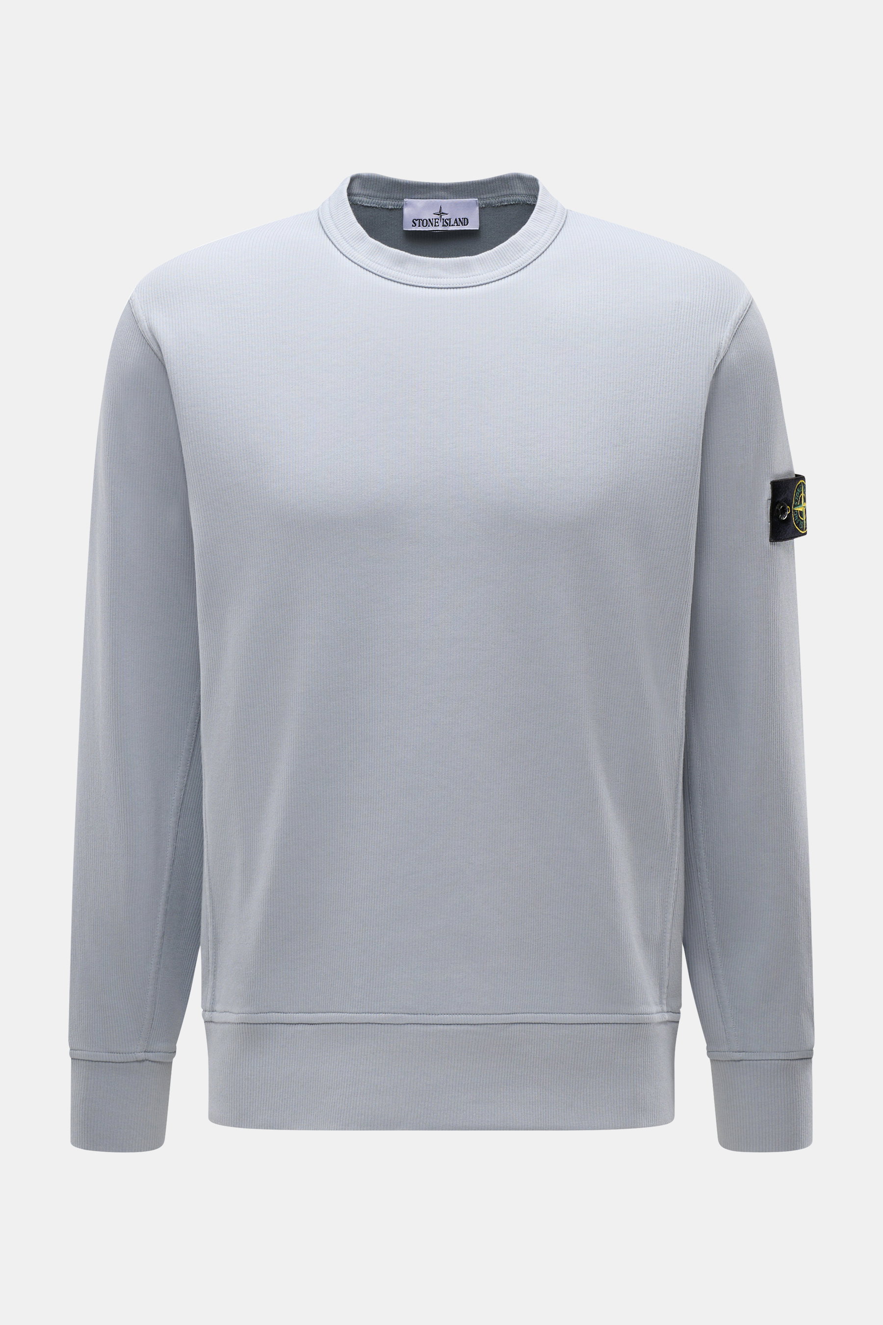 Front view of Stone Island R-Neck Longsleeve smoky blue in fine ribbed pure cotton knit with crew neckline, slim fit, soft touch, flexible cuffs, and compass badge on sleeve.

<p>Autumn essential: The long sleeve by STONE ISLAND combines characteristic ri