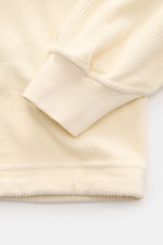 Close-up view of the Stone Island Corduroy Sweatshirt cream sleeve and cuff, showing soft pure cotton corduroy texture and ribbed details.

Description: <p>This sweatshirt from STONE ISLAND is made from pure cotton corduroy, giving it a special twist – pe