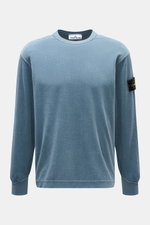 Front view of Stone Island Corduroy Sweatshirt Smoky Blue in pure cotton corduroy with ribbed crew neckline, cuffs, and compass badge on sleeve.

Description: <p>This sweatshirt from STONE ISLAND is made from pure cotton corduroy, giving it a special twis