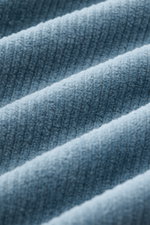 Close-up view of soft, smoky blue corduroy fabric texture from the Stone Island Corduroy Sweatshirt Smoky Blue.

<p>This sweatshirt from STONE ISLAND is made from pure cotton corduroy, giving it a special twist – perfect to combine with your next casual s