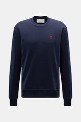 Front view of Ami Paris Crewneck Sweatshirt navy in pure cotton, regular fit with crew neckline, soft touch, logo stitching on chest, and ribbed cuffs. 

Description: <p>Comfortable basic: The AMI PARIS sweatshirt made of pure cotton is the ideal companio