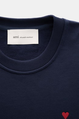 Close-up front view of Ami Paris Crewneck Sweatshirt navy showing crew neckline, ribbed cuffs, logo stitching on chest, made of soft pure cotton. 

<p>Comfortable basic: The AMI PARIS sweatshirt made of pure cotton is the ideal companion for sporty looks.