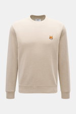 Front view of Maison Kitsuné Beige Melange Sweatshirt in slim fit with round neckline, soft cotton fabric, and signature fox patch on chest.

<p>Cool essential from MAISON KITSUNÉ: With the typical fox patch on the chest, this sweater becomes a favorite p