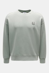Maison Kitsuné Sweatshirt mintgrün, frontale Nahaufnahme, Oversized Fit, Rundhalsausschnitt, weicher Baumwoll-Sweat mit typischem Fuchs-Patch auf der Brust.