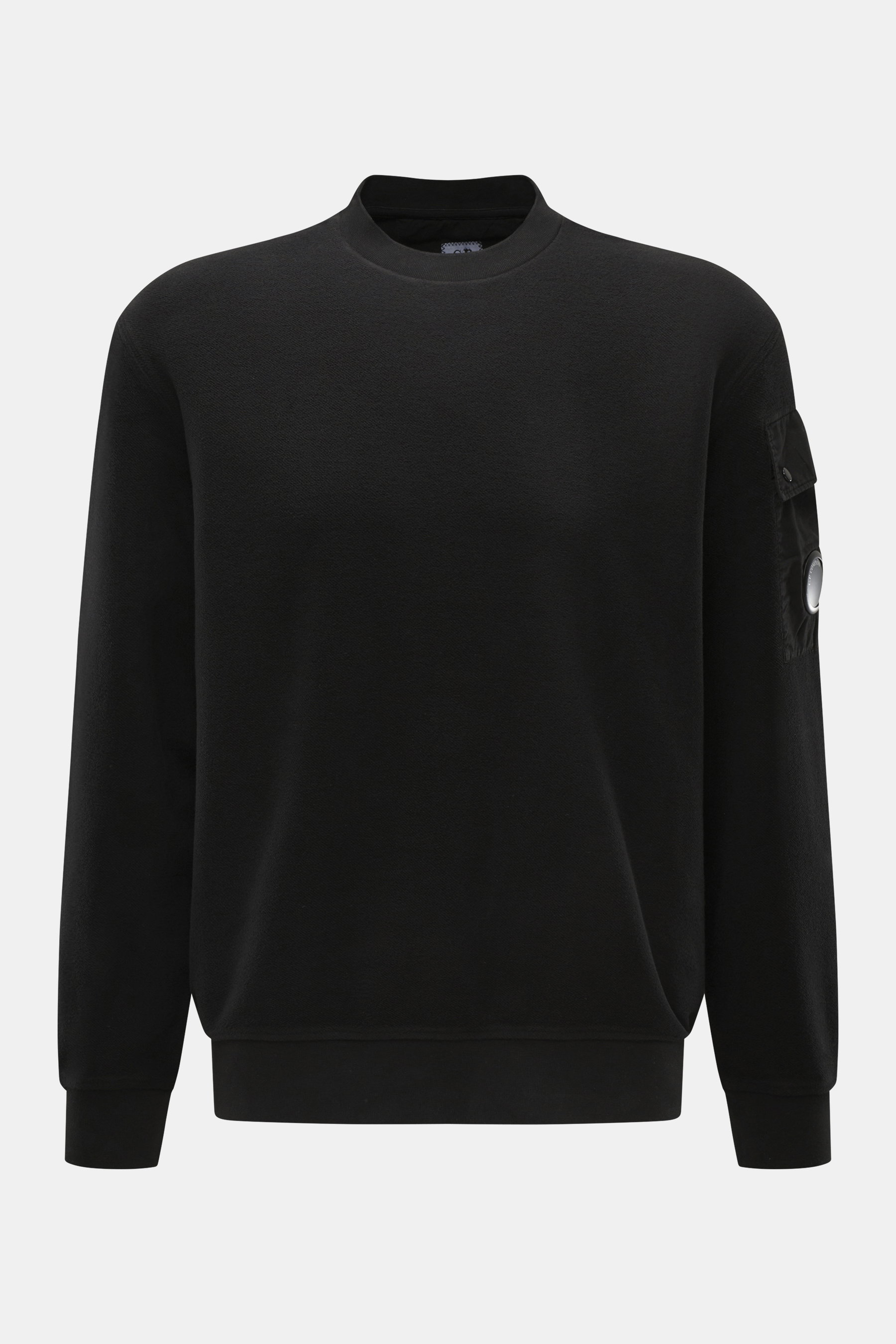 C.P. Company Sweatshirt black shown from front, inside-out cotton with soft touch, regular fit, crew neck, arm pocket with lens detail and ribbed cuffs.