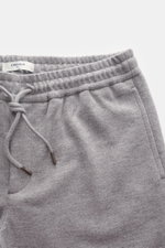 Close-up front view of Circolo 1901 Wool Jogpants grey melange showing elastic waistband with drawstring, side seam pocket, and soft wool jersey fabric. Casual sophistication: With its soft wool quality, the jogpants by CIRCOLO 1901 become a stylish optio