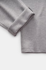 Close-up top-down view of Circolo 1901 Wool Jogpants grey melange in soft pure wool jersey, showing regular fit, straight cut, elastic waistband with drawstring, side seam pockets, and patch back pocket.