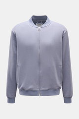 Front view of 04651/ A trip in a bag Sweat jacket 'CL Bomber' lavender, garment-dyed, with a robust two-way zip, blouson collar, slanted hip pockets, and ribbed bands. Relaxation on the move: The sweat jacket 'CL Bomber' by 04651/ A TRIP IN A BAG combines