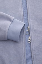 Close-up front view of the lavender 04651/ A trip in a bag Sweat jacket 'CL Bomber' showing garment-dyed organic cotton and linen blend fabric, soft ribbed sleeve cuff, and robust two-way silver zipper with ring pull. Relaxation on the move: The sweat jac