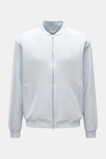 Front view of the 04651/ A trip in a bag Sweatjacke 'CL Bomber' pastellblau, a pastel blue oversized bomber jacket made from a mix of organic cotton and linen with a soft feel, garment-dyed finish, robust two-way zipper, typical blouson collar, slanted we