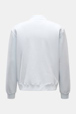 Rear view of the 04651/ A trip in a bag Sweatjacke 'CL Bomber' pastellblau in pastel blue, showing its oversized fit, soft fabric, ribbed cuffs, and typical blouson collar.

Description: <p>Entspannt unterwegs: Die Sweatjacke 'CL Bomber' von 04651/ A TRIP