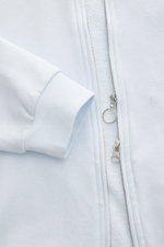 Close-up front view of 04651/ A trip in a bag Sweatjacke 'CL Bomber' pastellblau showing soft fabric, garment-dyed finish, robust two-way zipper, and ribbed cuff.

Description: <p>Entspannt unterwegs: Die Sweatjacke 'CL Bomber' von 04651/ A TRIP IN A BAG 