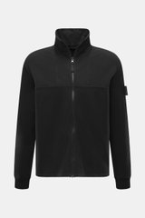 Stone Island Sweatjacke 'Ghost Piece' schwarz, frontal fotografiert, Stehkragen, Reißverschluss, tonales Kompass-Badge, elastische Baumwolle, Regular Fit.
